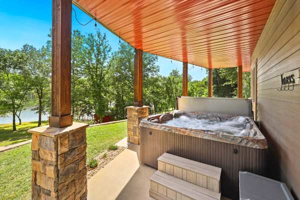 Lakefront vacation rental with hot tub in Springdale Arkansas managed by Weekender Management